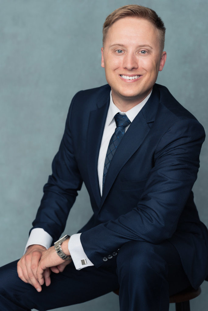 professional and modern headshot for men in blue suit
